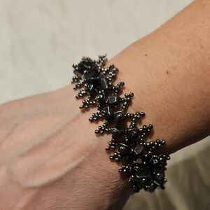 Platinum beaded bracelet with Hematite larger bead accents
